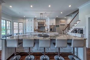 Large home remodel project featuring full marble slab kitchen islands to captivate Freehold guests.