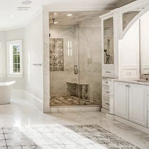 Spacious new luxury bathroom in Mantoloking offers natural stone, a soaking tub and elegant finishes.
